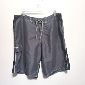 RS Surf black and silver boardshort/swim trunks.